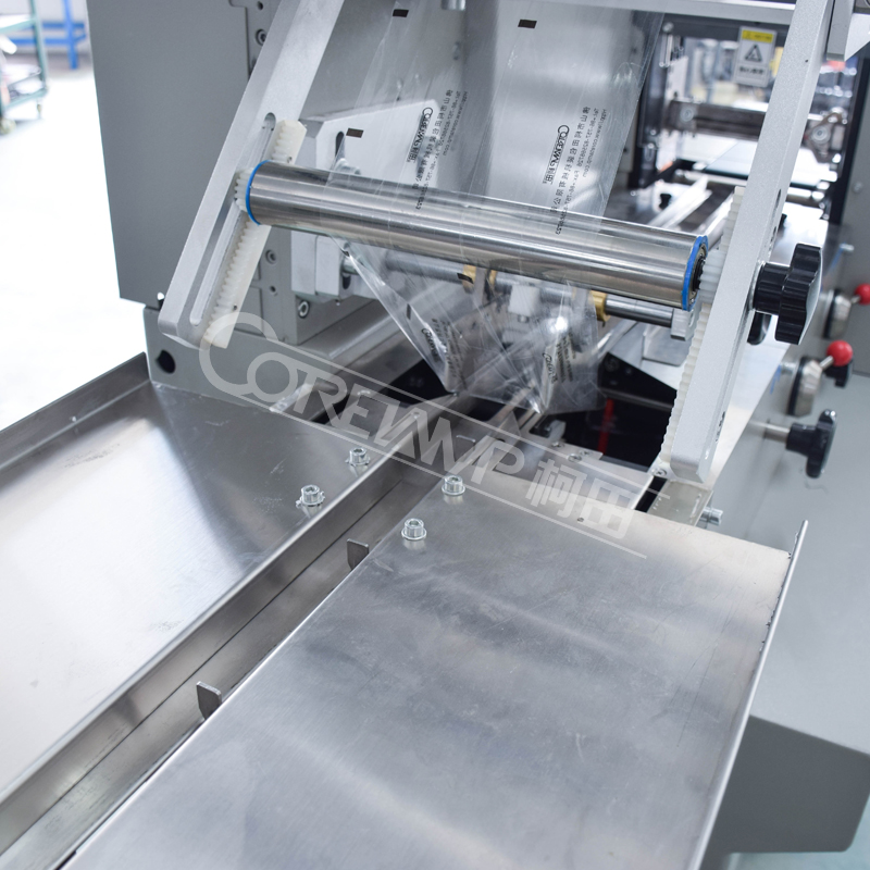 Automatic cheese wrapping machine